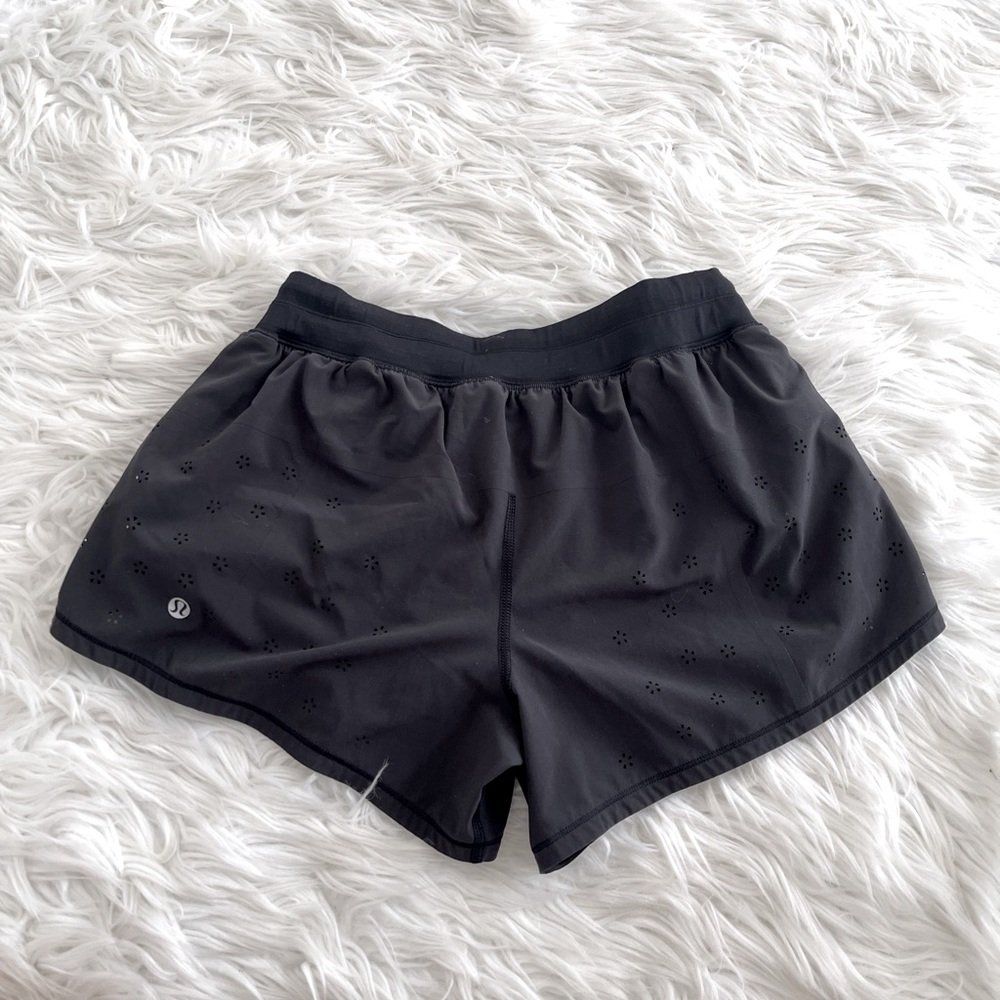 Lined Lululemon black running shorts